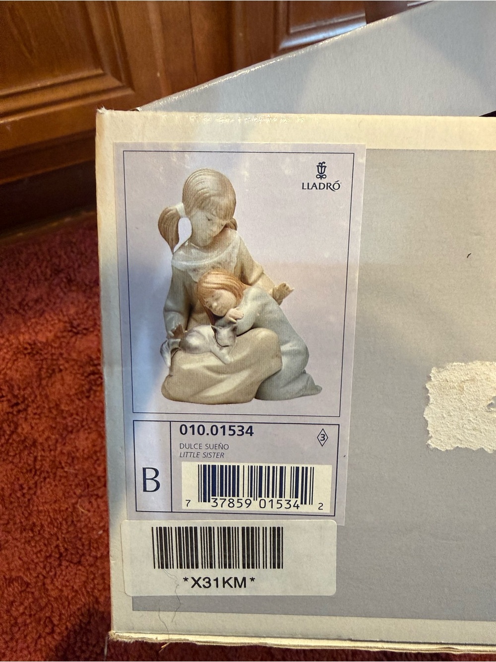 Lladró 'Little Sister' Ceramic Figurine in Cream